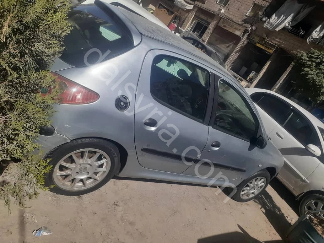 للبيع بيجو 206/2003