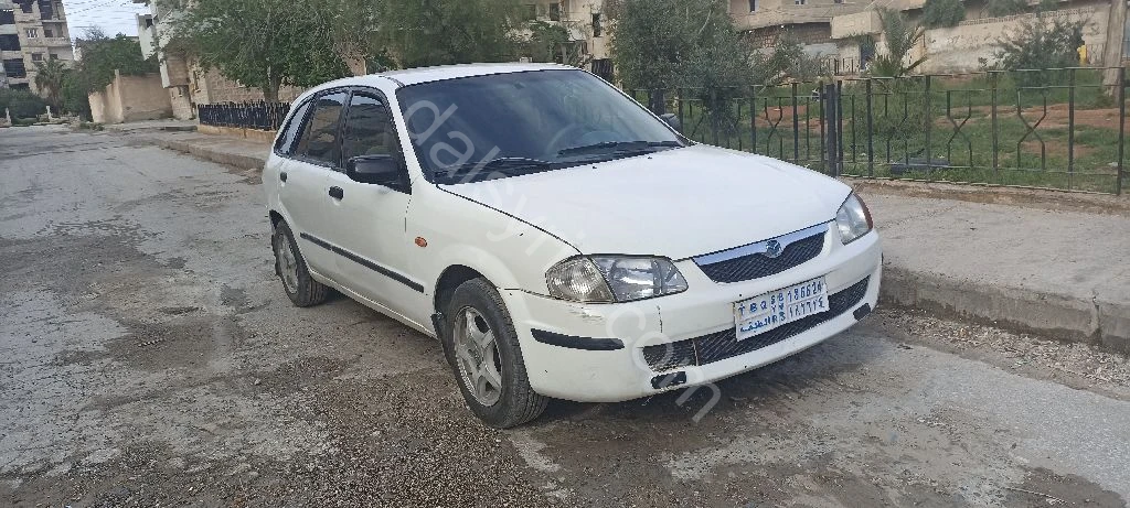 للبيع مازدا 323 فاميليا 2002